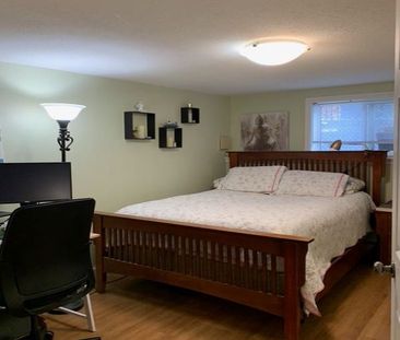 Upper Unit – Beautiful Carriage Home - Photo 1