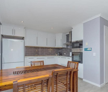 Modern Single-Level Duplex with Spacious Deck in Prime Location - Photo 6