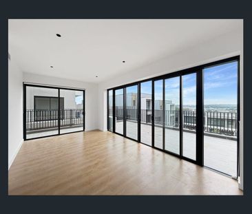 Spacious Three-Level Townhouse with Workshop & Dual Outdoor Living - Photo 1