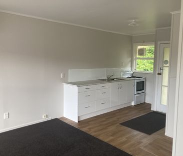 This generous two-bedroom unit offers an open-plan living area, two... - Photo 6