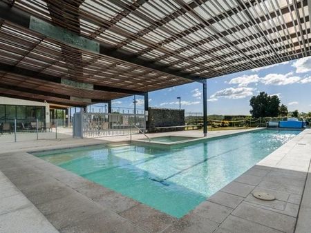 Stunning Home in Sought After Coomera Waters with Pool Access + More! - Photo 4