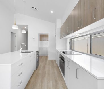 Brand New 4 bed 2 bath house with ducted Air - Photo 1