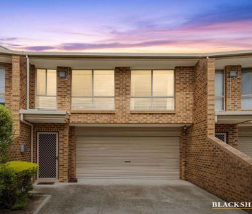 ELEVATED TOWNHOUSE - Photo 1