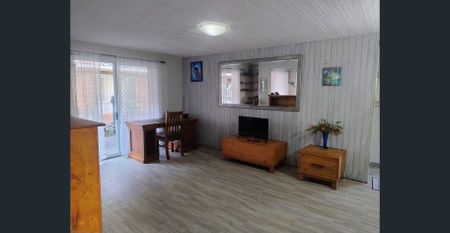 Furnished 2-Bedroom Home in the Heart of Emerald Beach - Photo 2