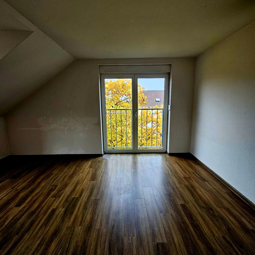 gemütliche Dachgeschoss-Wohnung in einer ruhiger Wohngegend - Photo 1