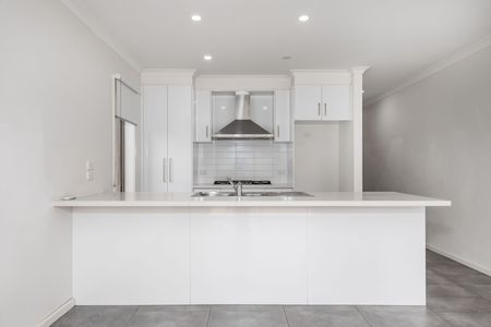 Sleek Style Meets Space: Contemporary Four-Bedroom Home in Highly Sought-After Weir Views - Photo 2