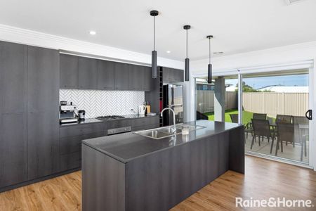 Modern Family Home in Boorooma - Photo 4