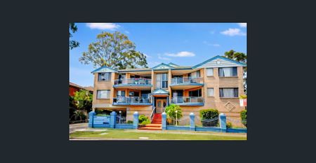 MODERN HOME UNIT WITH ALL THE BELLS AND WHISTLES - Photo 3