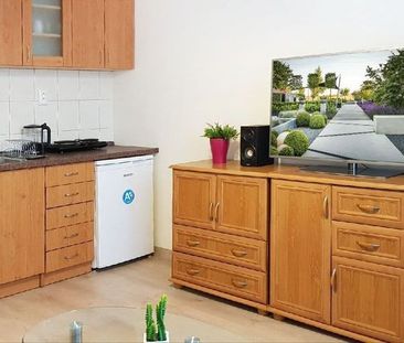 Ponúkame na prenájom útulnú garsónku s balkónom na Komenského ulici. - Fotografia 1