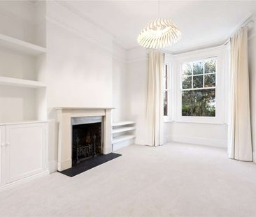 A lovely family home with grand proportions and a wider than averag... - Photo 2