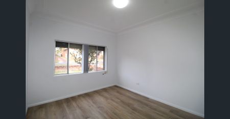 RENOVATED THREE BEDROOM BRICK HOME - Photo 2