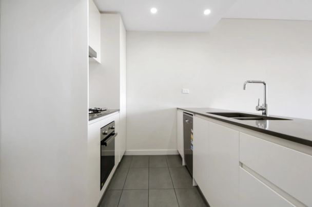 Immaculate and Convenient Two Bedroom Apartment - Photo 1