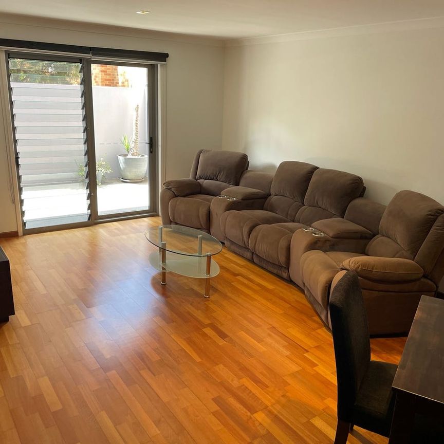 Stylish and Spacious 3-Bedroom Townhouse - Photo 1