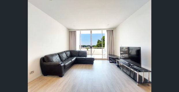 Delightful Living - Two-Bedroom Split-Level Apartment with Furnished Option - Photo 1