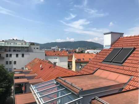 Exklusive Dachgeschosswohnung mit außergewöhnlichem Raumgefühl und hochwertiger Ausstattung - Photo 2