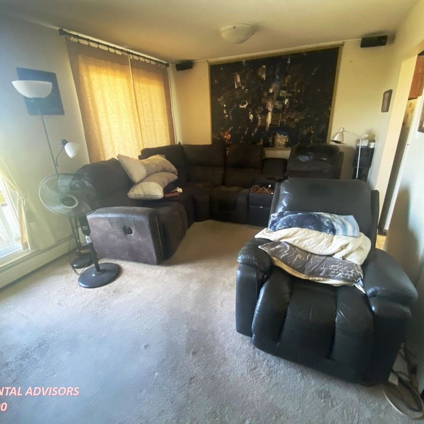 GREAT 2 BED 1.5 BATH 4TH-FLOOR APARTMENT W/AN OUTDOOR PARKING STALL IN THE COMMUNITY OF BELMEAD - Photo 1