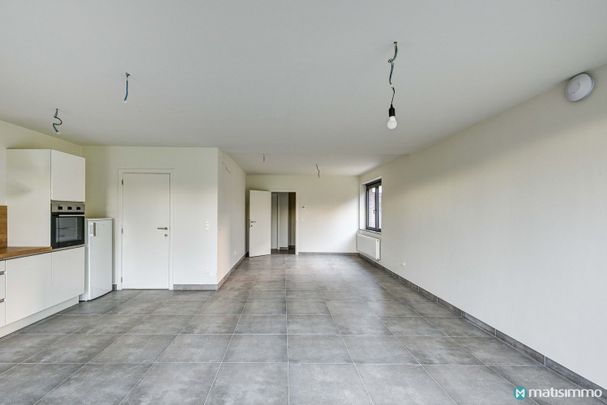 INSTAPKLAAR GELIJKVLOERS APPARTEMENT MET 2 SLAAPKAMERS TE MOPERTINGEN (BILZEN) - Foto 1