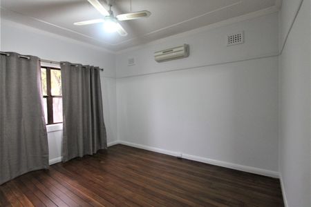 2 Bedroom Home with Sunroom, In A Great Position - Photo 5