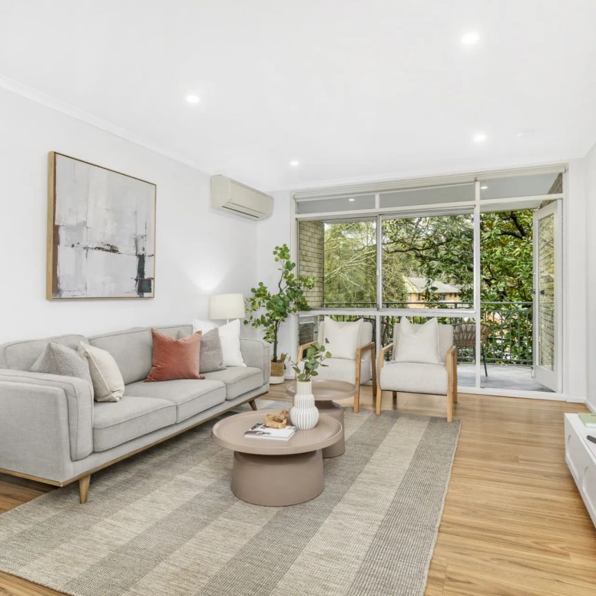 Renovated Three-Bedroom Retreat in Ultra Convenient Location Moments from Everything - Photo 1