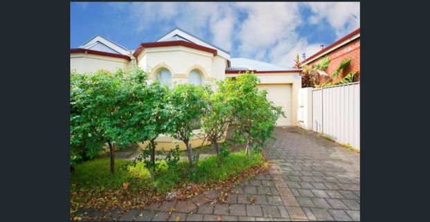 Urban Elegance Meets Suburban Comfort! - Photo 1