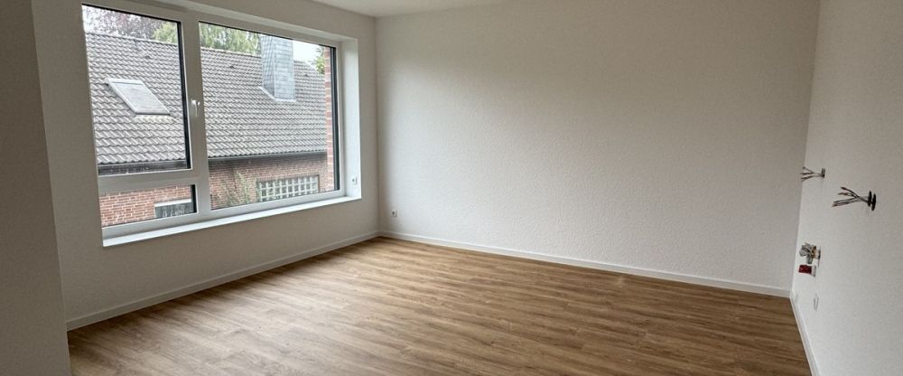 Dachgeschosswohnung in ruhiger Wohnsiedlung! - Foto 1