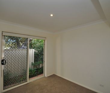 Townhouse in Ideal Location - Photo 1