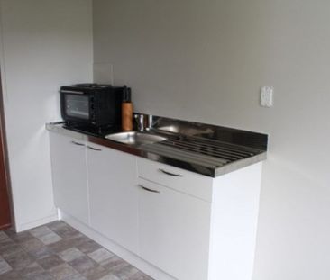 Cozy studio unit attached garage. - Photo 4