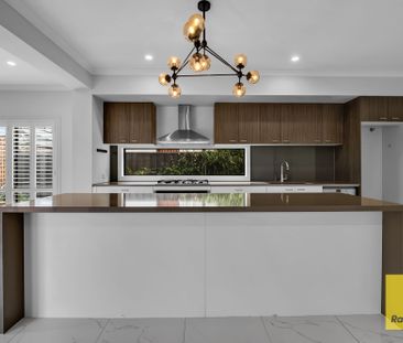 Exceptional 5-Bedroom Family Home with Dual Master Suites and Multi... - Photo 4
