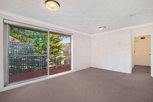 Top Floor Apartment in Prime Location - Photo 1