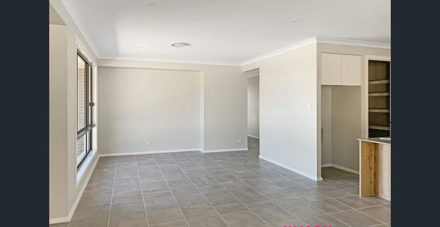 Welcome to your dream home in the sought-after Watagan Park Estate! - Photo 1