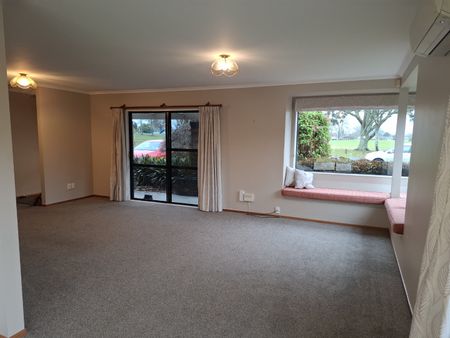 This fantastic family home offers a generous open-plan living on the ground floor, seamlessly flowing out to a rear patio and fully fenced yard—perfect for entertaining or relaxing with family. - Photo 2