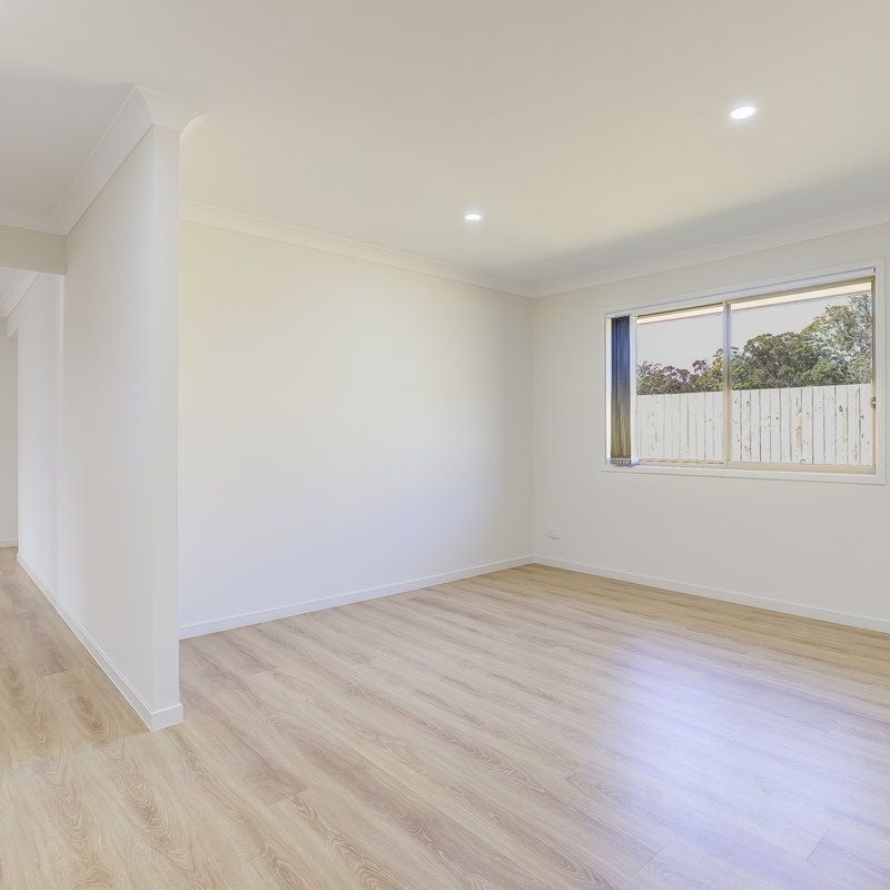 Modern Family Living in the Sought-After Camelot Estate - Photo 1