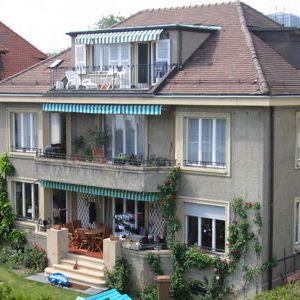 Appartement de 5 pièces au 1er avec balcon et vue sur le lac. - Photo 1