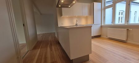 Renoveret lejlighed med privat altan - Photo 5