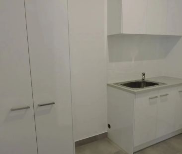 STYLISH AND IDEALLY LOCATED - Photo 3