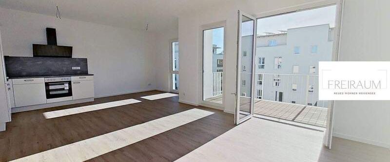 EIN NEUER LEBENSRAUM: Weitläufige 3-Zimmer-Wohnung mit BALKON und EBK im Weißenseer Neubauquartier FREIRAUM - Photo 1