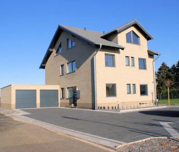 Erdgeschosswohnung mit Einbauküche, Erdwärme und Garten mit unbezah... - Photo 4