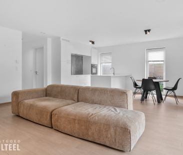 Energiezuinig gelijkvloers appartement met 2 slpkrs, garage en tuin! - Photo 1