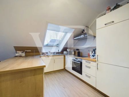 Moderne Dachgeschosswohnung in Hinte-Westerhusen - Foto 4