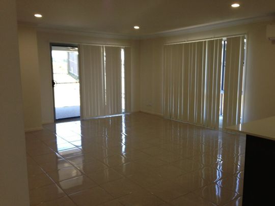 4 Bedroom Lowset Brick Home in Bucasia - Photo 1