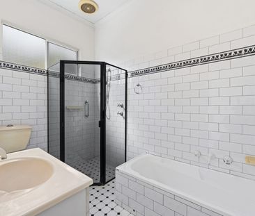 Character Home with Expansive North-Facing Rear Yard - Photo 5