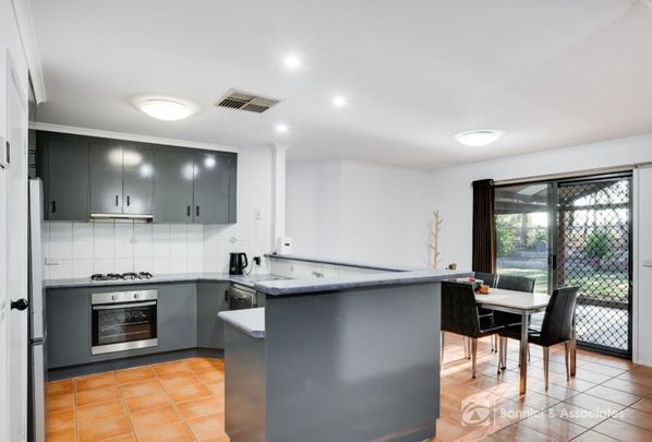 IDEAL HOME IN A CONVENIENT LOCATION - Photo 1