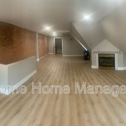 $2,395 / 2 br / 1.5 ba / Solid brick semi-detached home in prime location! - Photo 1