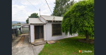 AFFORDABLE FAMILY HOME - Photo 2