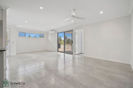 2BED HOME WITH A LARGE OPEN PLAN LIVING WITH AIR-CON - Photo 2