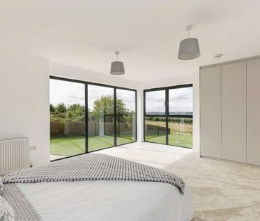 A beautifully converted detached barn-style home in a peaceful rura... - Photo 2