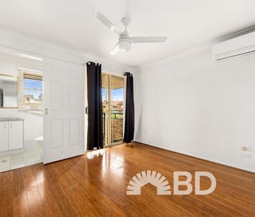 Relaxed Townhouse Living with Space & Convenience - Photo 1