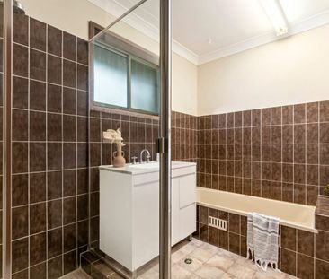 Waterfront Family Living with Tranquil Views & Spacious Split-Level... - Photo 6