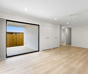 Modern Family Home with Indoor / Outdoor Living and Solar! - Photo 1