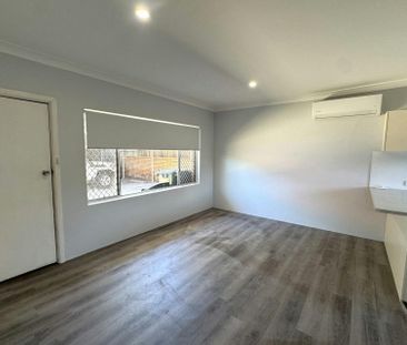 FRESHLY RENOVATED 2 BEROOM UNIT IN A PRIME POSITION! - Photo 1